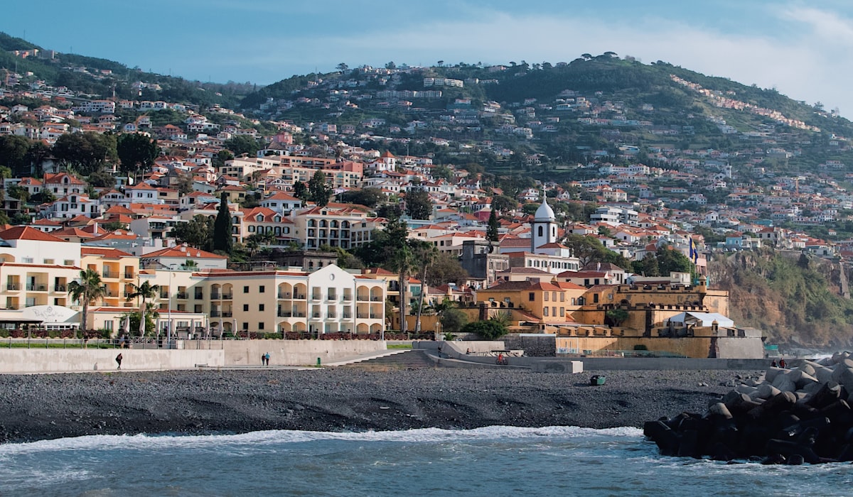 Funchal's Zona Velha seafront with the yellow Fortaleza de São Tiago