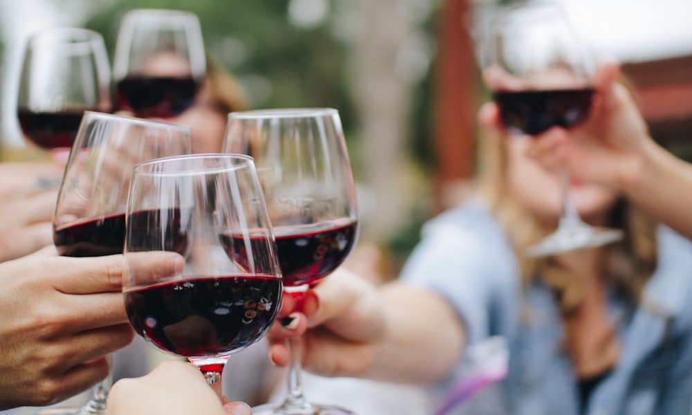 Glasses of Madeira wine raised in a toast